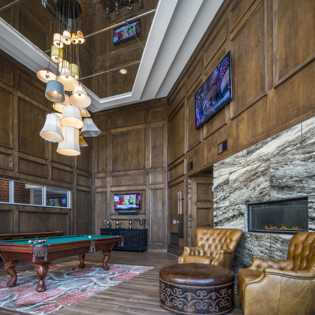 The Arcadian - Luxurious Lounge Featuring Wood Paneling and a Pool Table